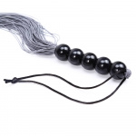 Bondage whip with soft straps and handle with black pearls - Image 3